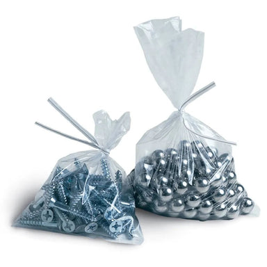 Two clear plastic bags filled with metal balls on a white background
