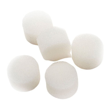 Five white foam balls on a white background