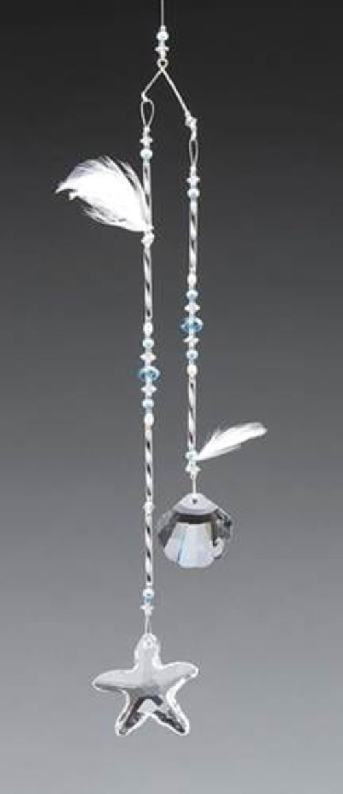 Decorative hanging ornament with feathers, beads, and a crystal on a gray background
