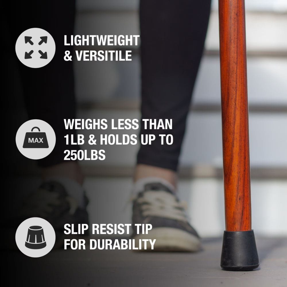 Wooden walking stick with text highlighting features on a blurred background