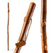 Two wooden walking sticks with a brand tag on a white background