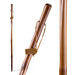 Wooden walking stick with a gold tag on a white background