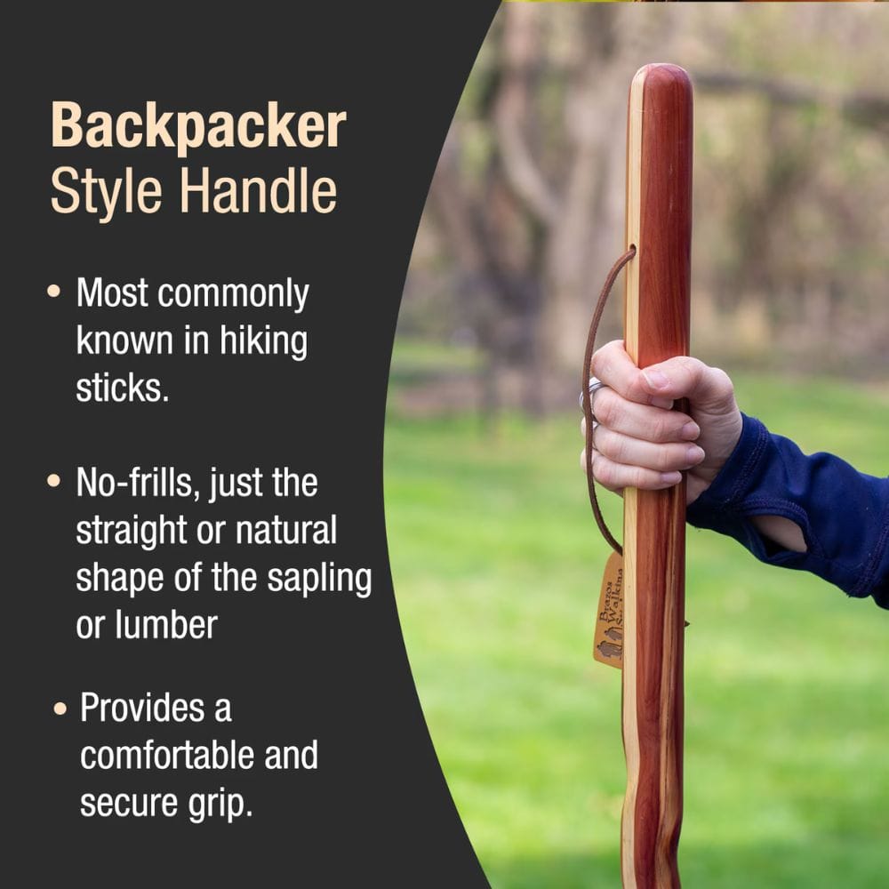 Wooden hiking stick held by a person with text about backpacker style handles.