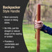 Wooden hiking stick held by a person with text about backpacker style handles.