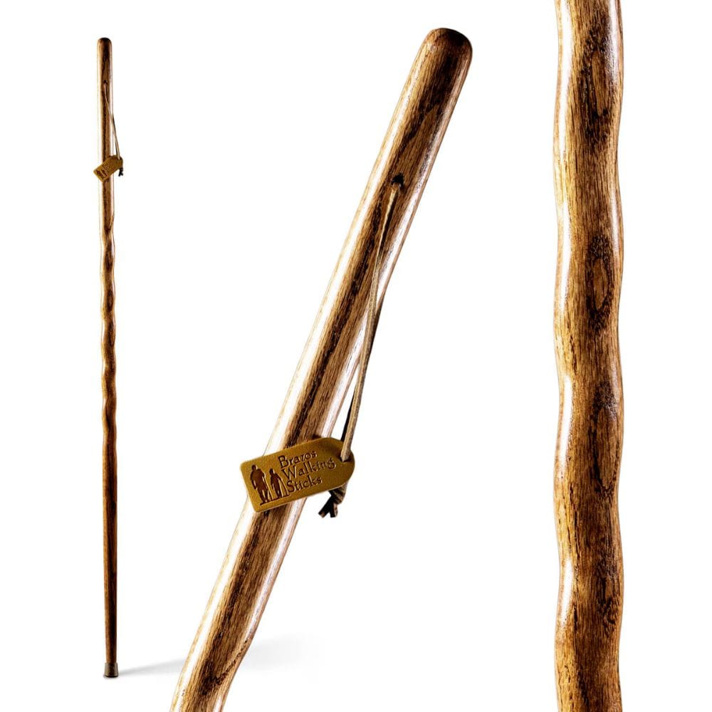 Wooden walking sticks with a brand tag on a white background