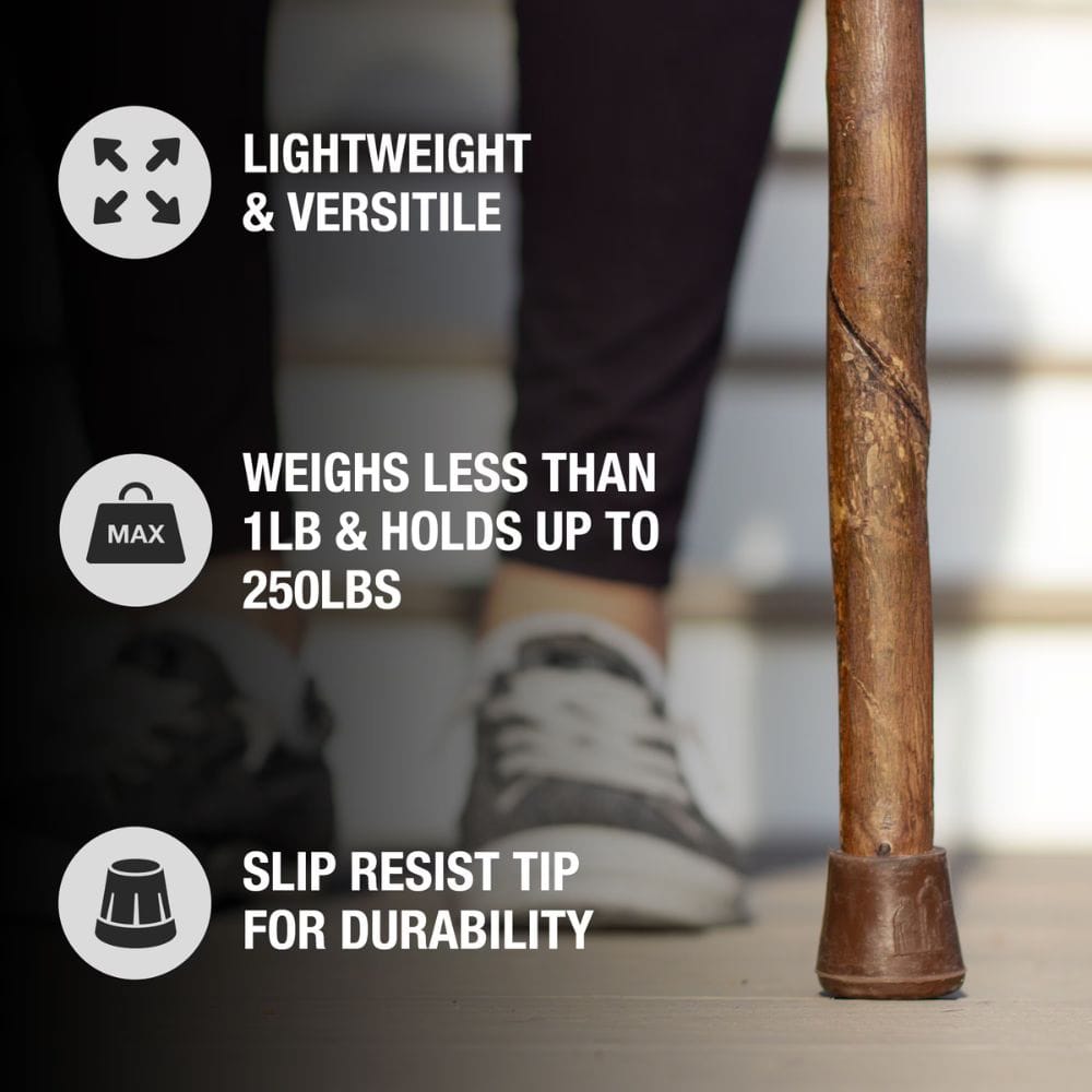 Wooden walking stick with text highlighting features on a blurred background