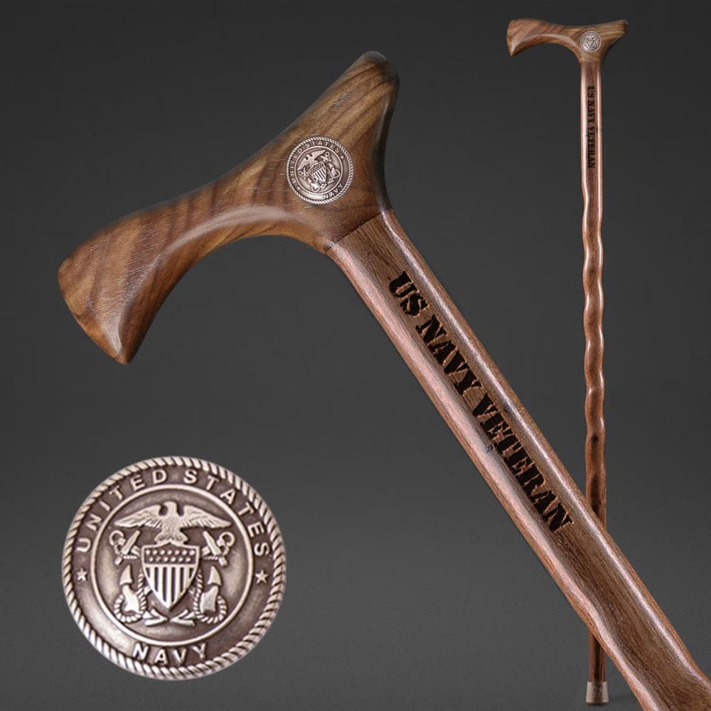 Wooden walking cane with engraved 'United States Navy Veteran' on a dark background