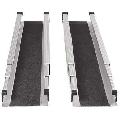 Two black ramps with silver metal sides on a white background