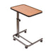 Adjustable height table with wooden top and metal frame on a white background