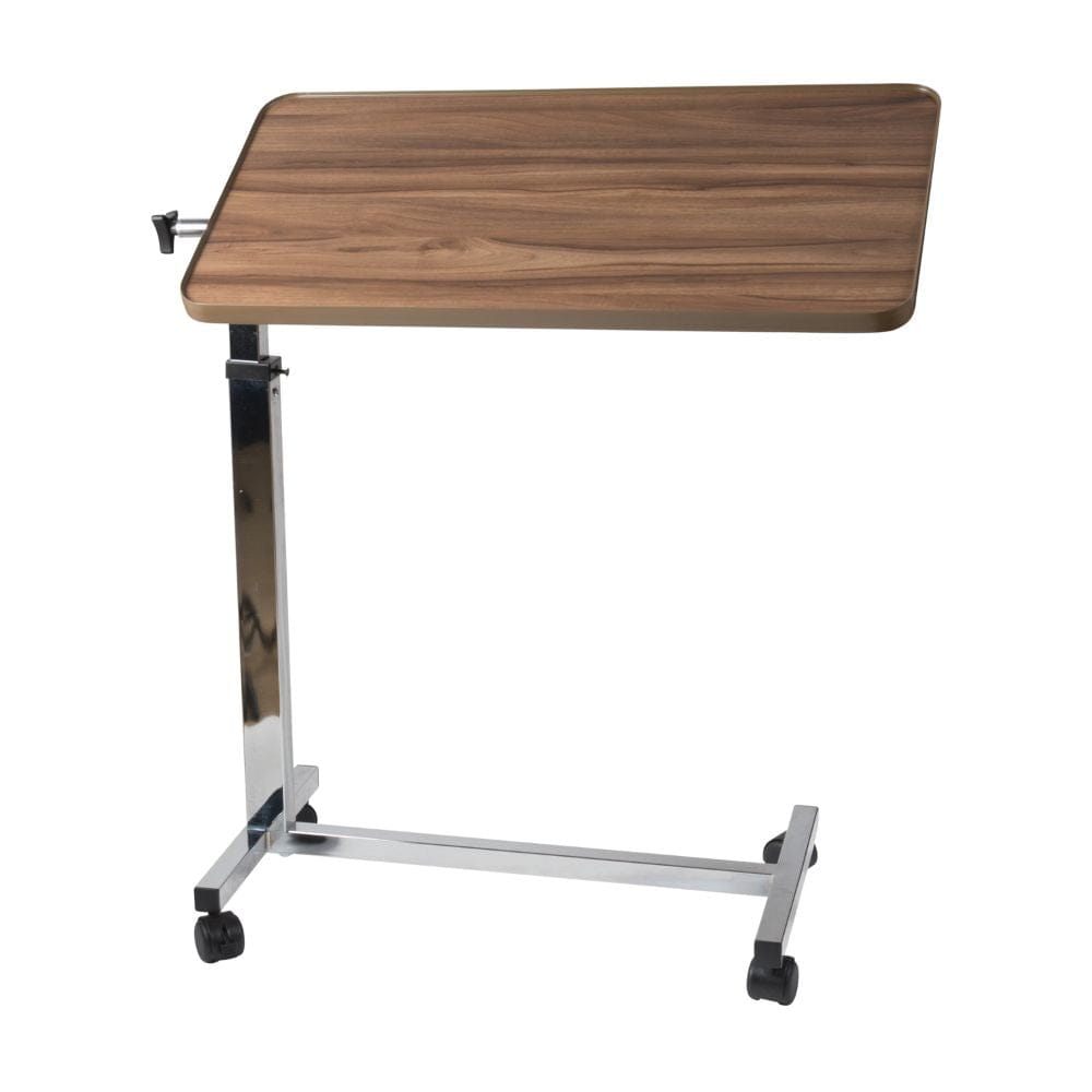 Wooden overbed table with adjustable height on a white background