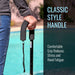 Person holding a walking cane with a classic style handle by a pool.