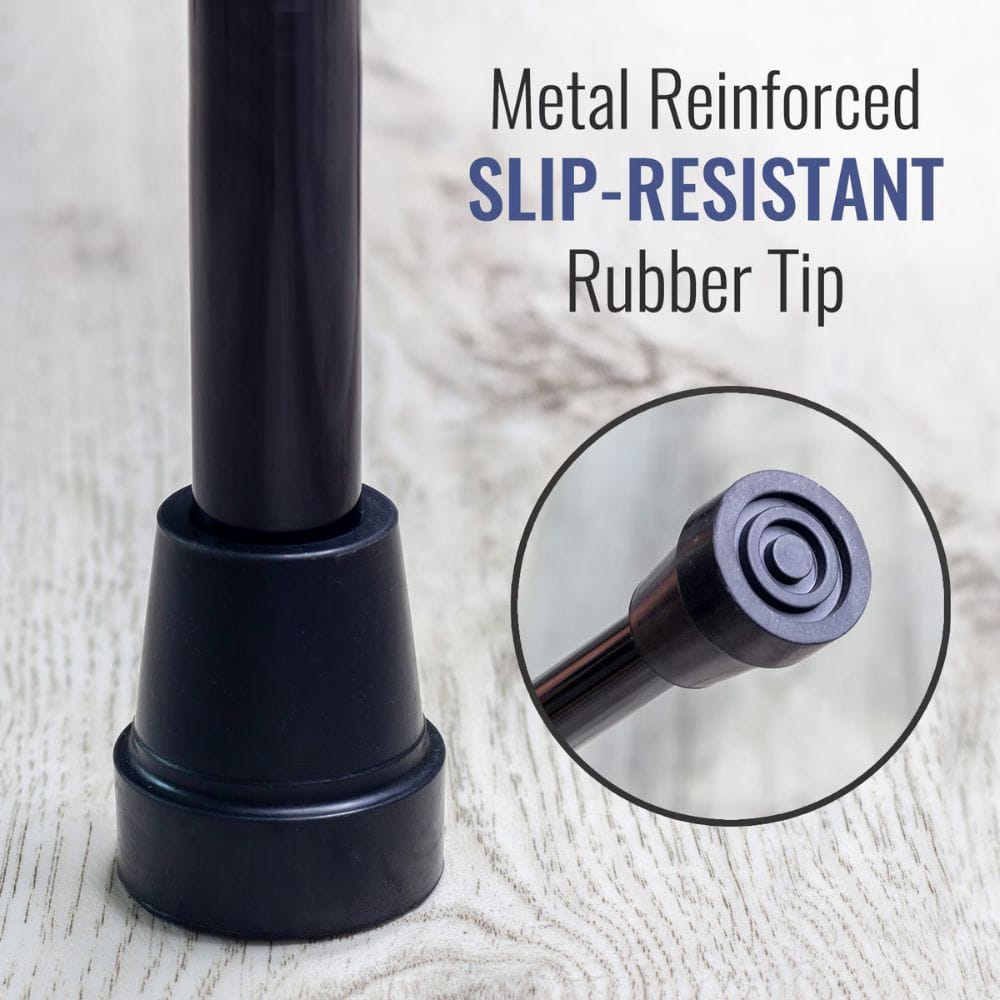 Black metal rod with slip-resistant rubber tip on a light wood background