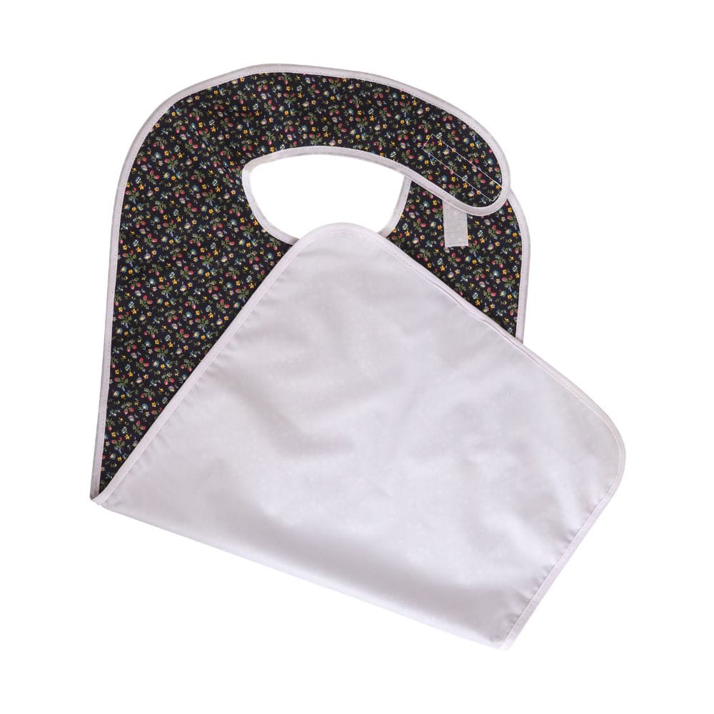 Baby bib with black and white patterned back and white front on a white background