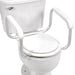 White toilet with a seat and armrests on a white background