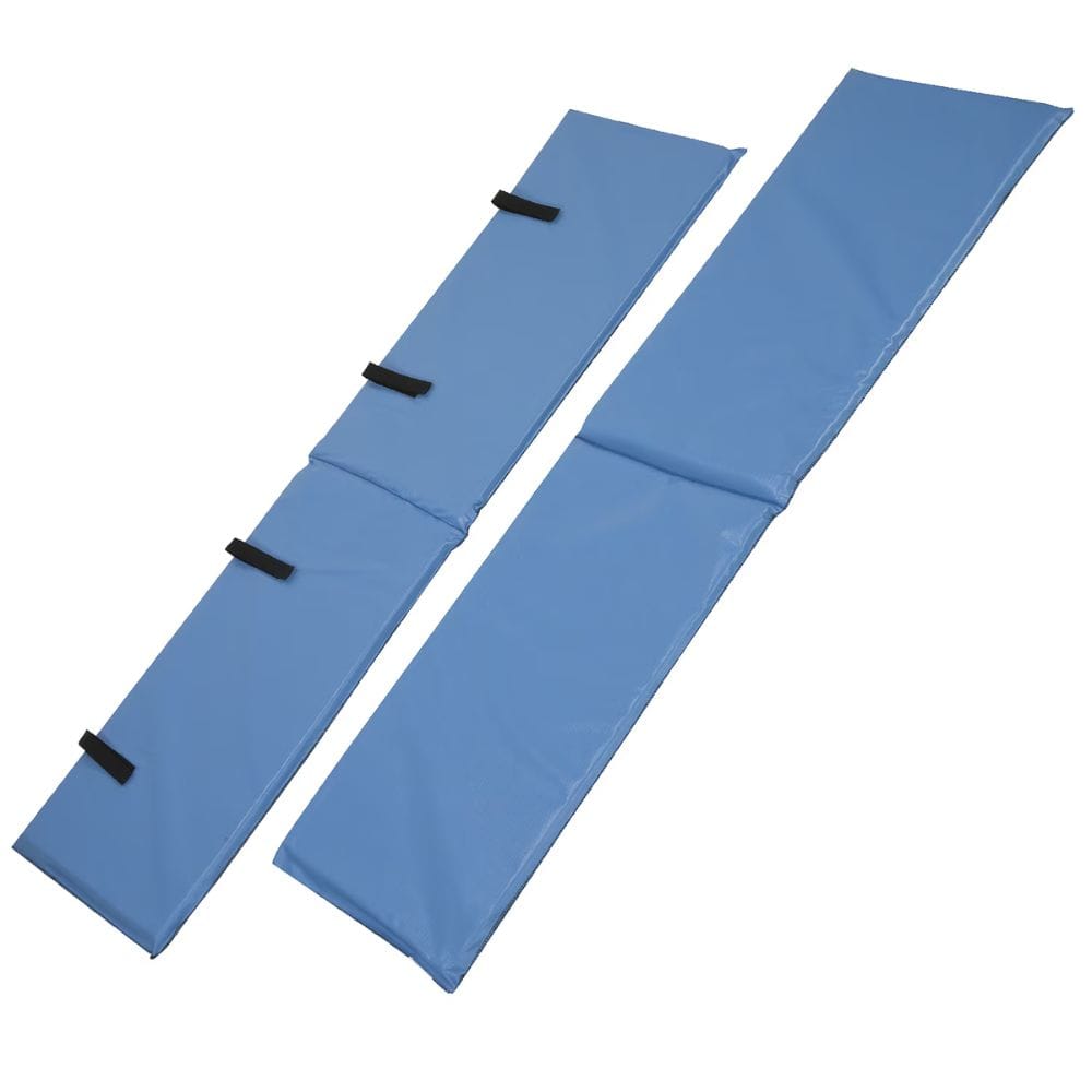 Two blue folding mats with black straps on a white background