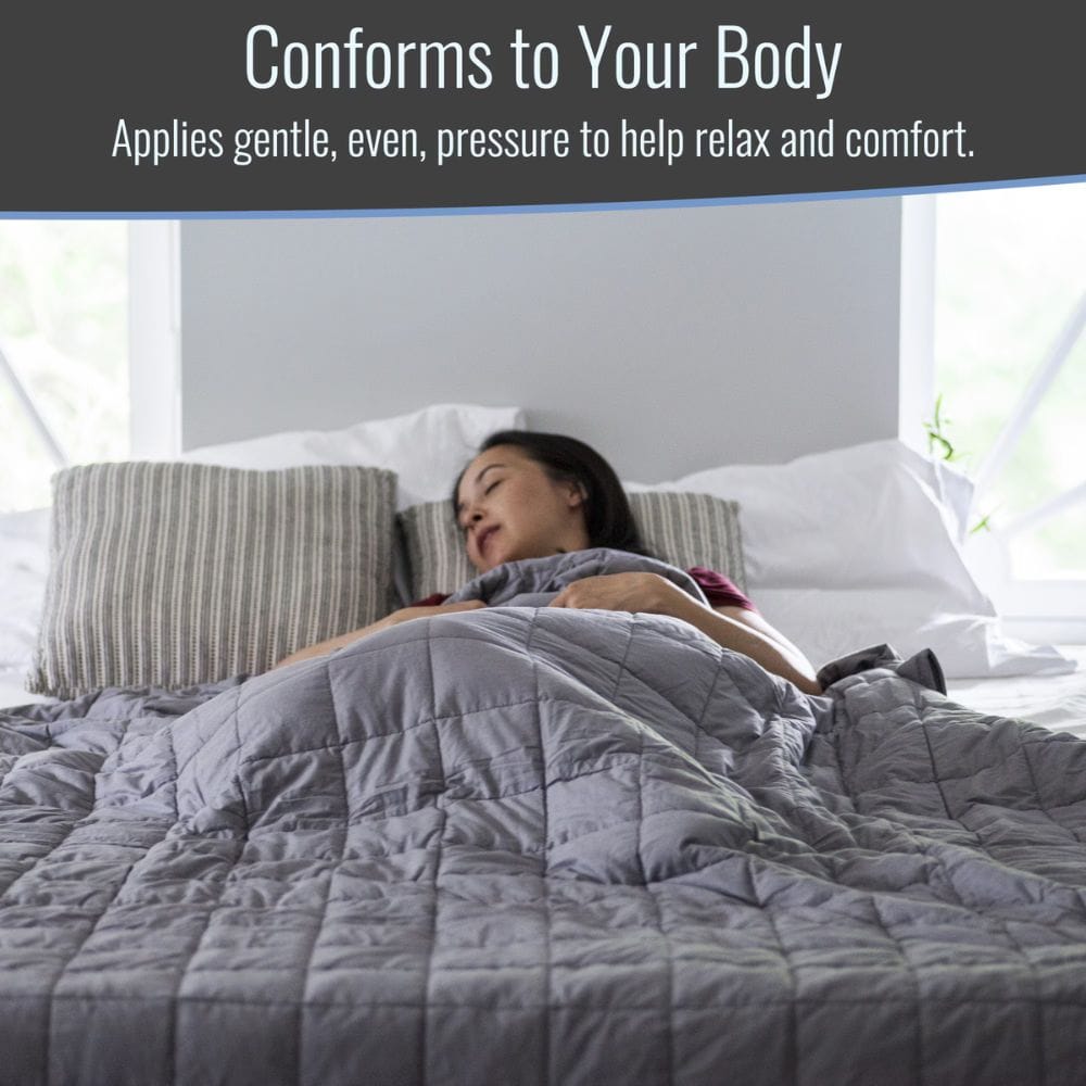 Woman lying in bed under a weighted blanket with text about conforming to body pressure.