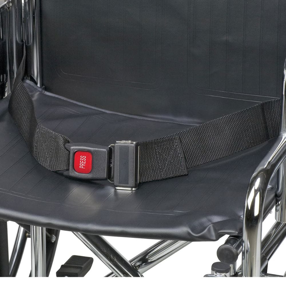 Black seat belt with a red 'PRESS' button on a wheelchair seat.