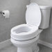 A white ceramic toilet with the lid open, set in a modern bathroom with gray tiled walls and floor.