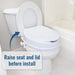 A white toilet seat cover installed on a white toilet in a bathroom setting, with a blue arrow and text overlay that reads 'Raise seat and lid before install'.