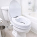 A white toilet with the lid open, fitted with a white contoured toilet seat and matching toilet liner, shown in a bright white bathroom next to a bathtub.