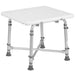 White adjustable shower seat with metal frame on a white background