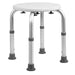 Adjustable height stool with a white seat on a white background