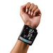 Hand wearing a HealthSmart blood pressure monitor on a white background
