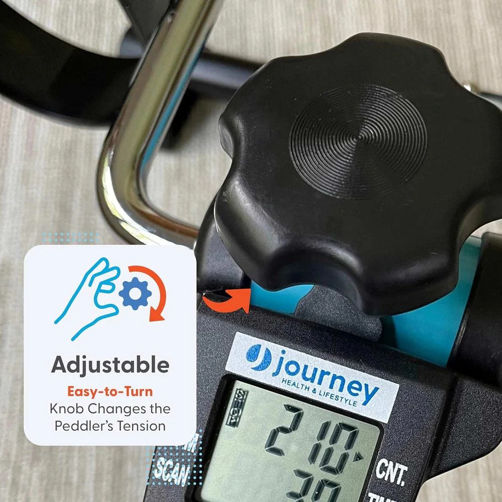 Exercise bike with adjustable tension knob and digital display, featuring the 'Journey' brand.