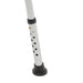 White cane with black rubber tips on a white background