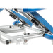 Close-up of a blue and silver exercise bike frame on a white background