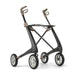 Black and beige folding stroller on a white background