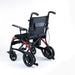 Black and red manual wheelchair on a white background