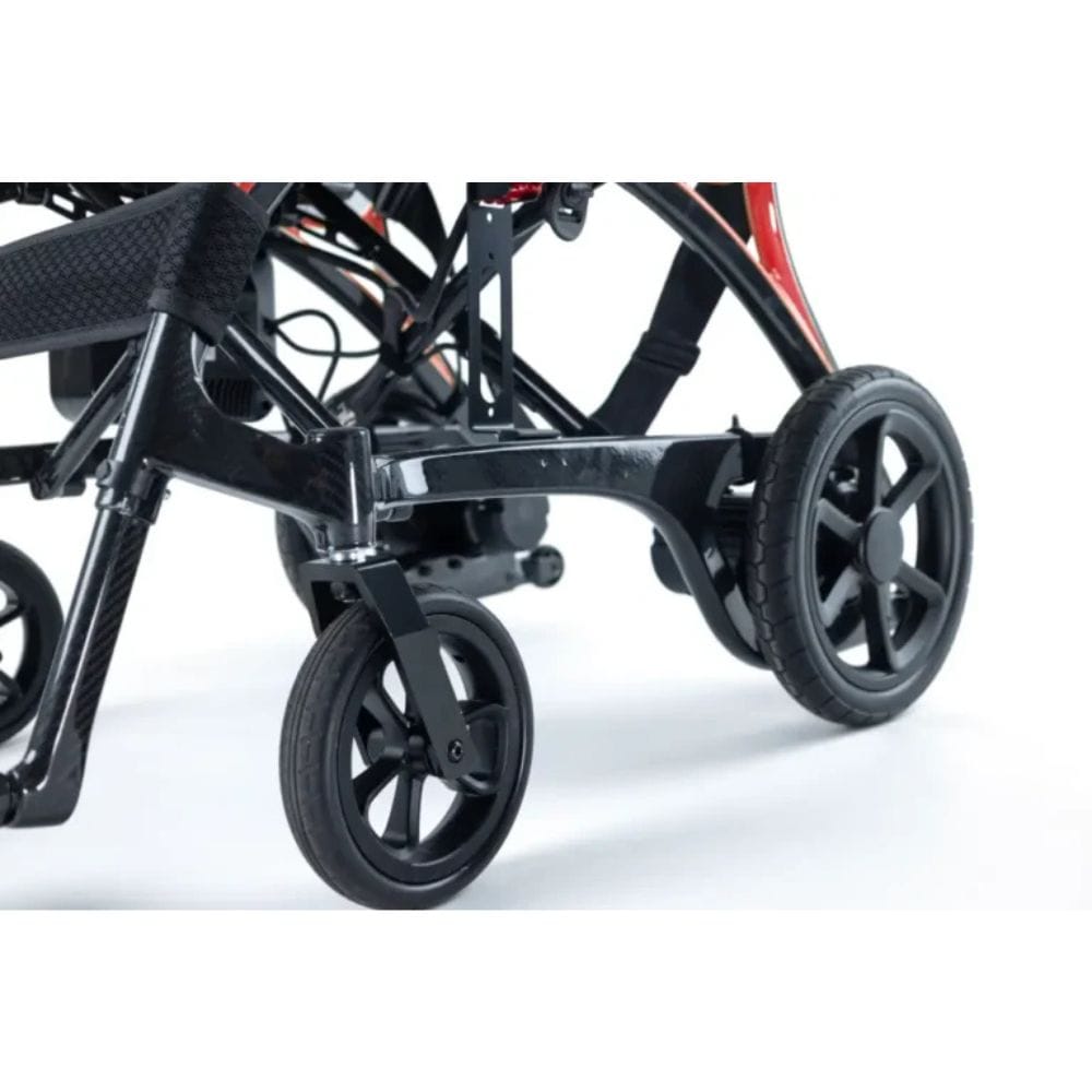 Close-up of a wheelchair with black wheels on a white background