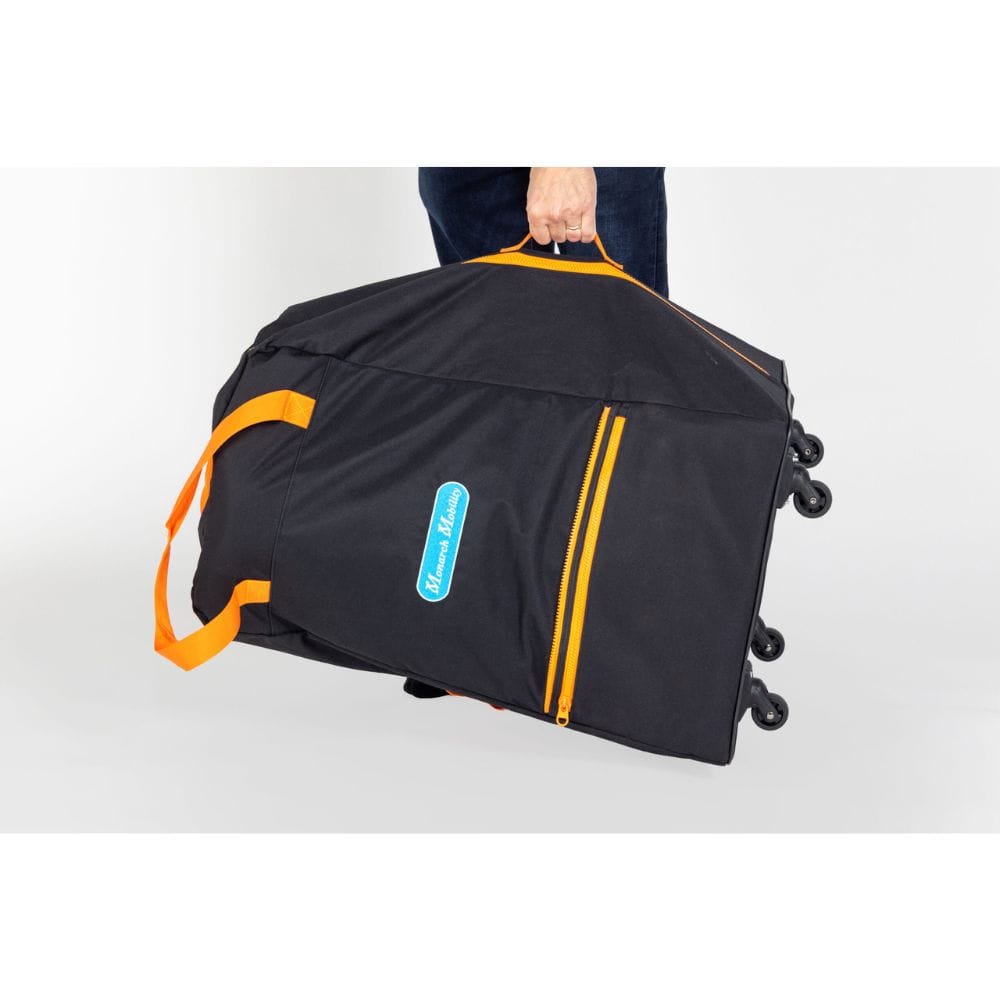 Black and orange suitcase with wheels on a white background