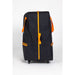 Black rolling suitcase with orange accents on a white background