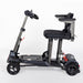 Black mobility scooter with a seat on a white background