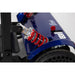 Close-up of a blue vehicle with red shock absorbers on a white background