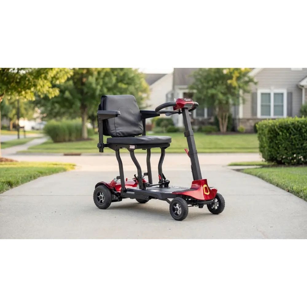 Mobility scooter on a sidewalk with a residential background