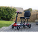 Mobility scooter with a seat on a wooden deck outdoors