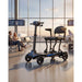 Mobility scooter with a chair attachment in an airport terminal.