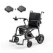 Black wheelchair with attached footrests on a white background