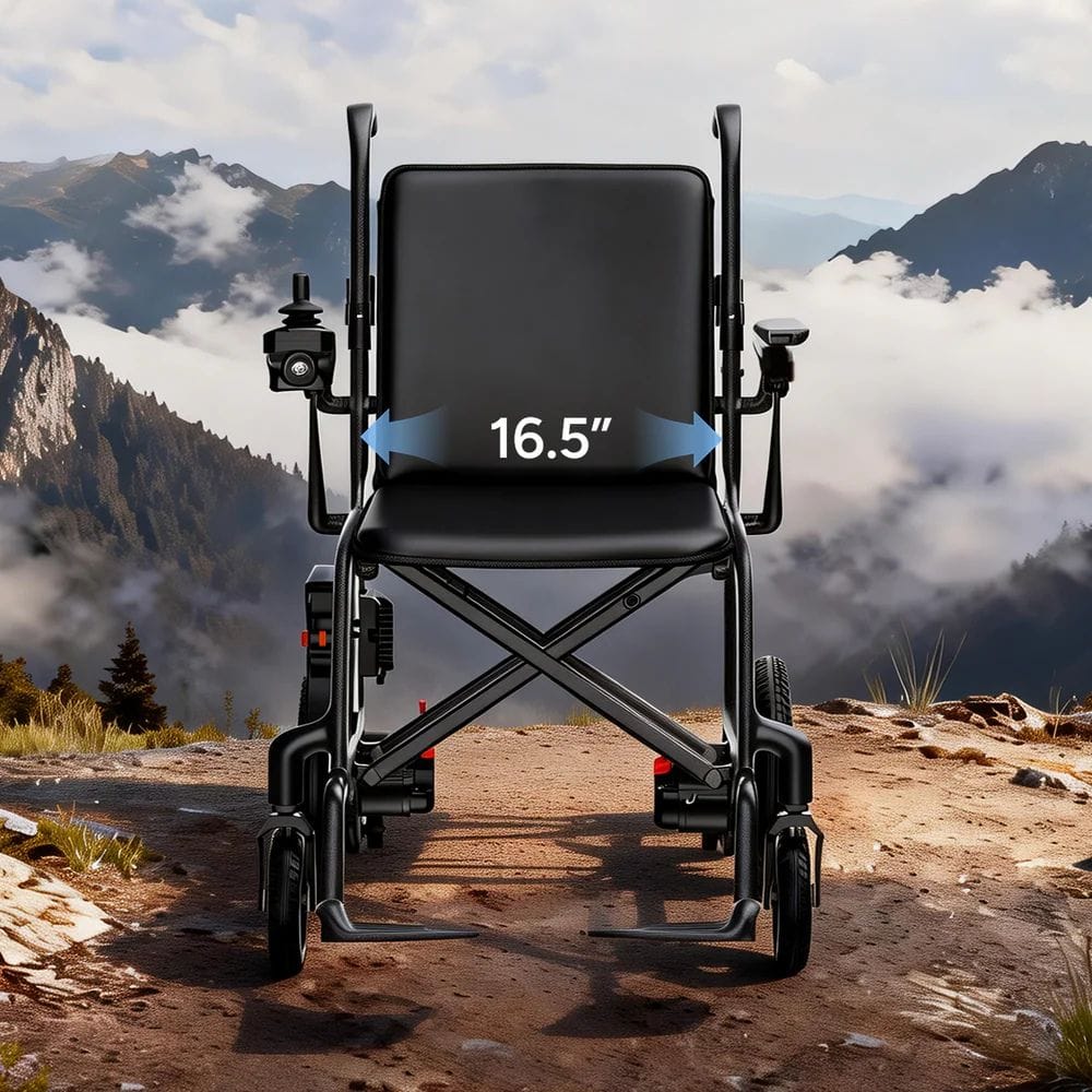 Black wheelchair with 16.5-inch seat width measurement against a mountainous landscape.