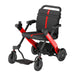 Black and red mobility scooter on a white background