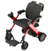 Red and black mobility scooter on a white background