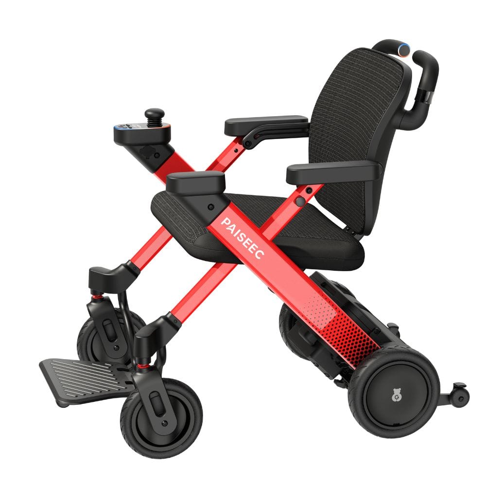 Foldable electric wheelchair with red frame and black seat on a white background