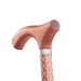 Copper-colored walking cane with a textured handle on a white background