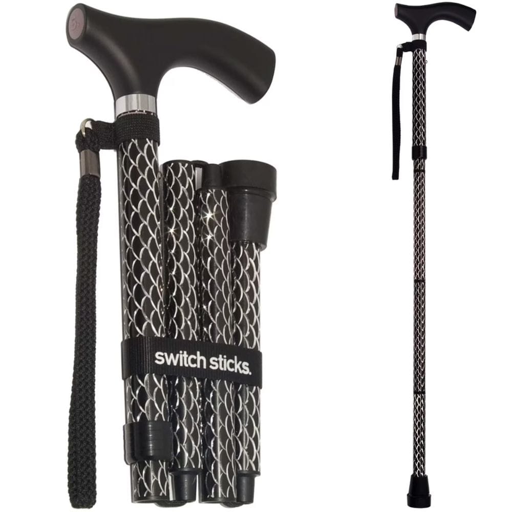 Collapsible walking cane with patterned handle and black shaft, featuring 'switch sticks' branding.