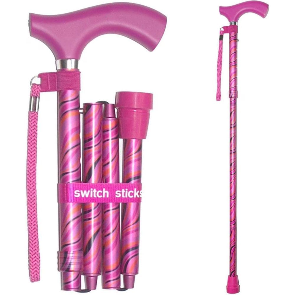 Pink walking cane with switch stick mechanism on a white background