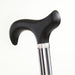 Close-up of a black walking cane handle on a white background