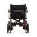 Black travel wheelchair with visible branding on a white background